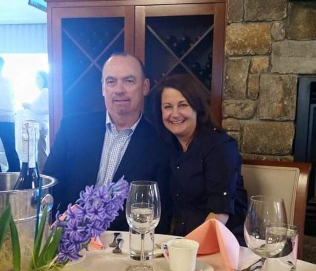 Man and woman sitting at a dinner table